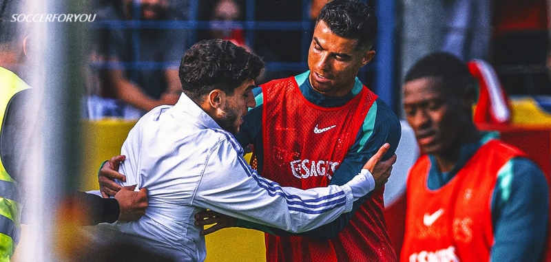 A fan grabbed Cristiano Ronaldo during a tumultuous open training session